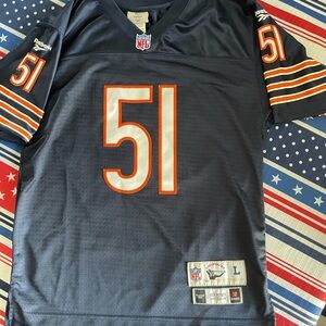 Dick Butkus throwback Reebok NFL Jersey Number 51.  Unisex youth or small adult